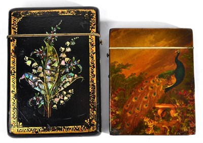 Lot 607 - A Painted Papier Mache Card Case, 19th century, decorated a peacock in a garden setting, an urn...