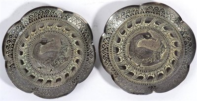 Lot 617 - A Pair of White Metal Shaped Circular Dishes, untraced marks, decorated with a stylised goose...