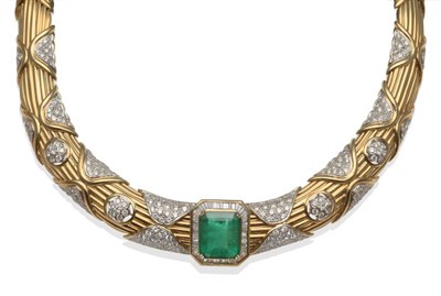 Lot 336 - ~ An Emerald and Diamond Necklace, the emerald within a border of baguette cut diamonds, on a...