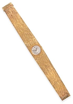 Lot 636 - A Lady's 9ct Gold Wristwatch, signed Bueche Girod, 1973, lever movement, silvered dial with...