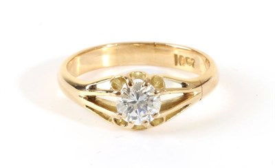 Lot 645 - A Solitaire Diamond Ring, a round brilliant cut diamond in an extended claw setting, to a...