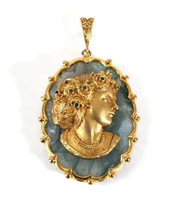 Lot 647 - A 9 Carat Gold Moss Agate Cameo Pendant, a cast cameo depicting a female bust, with an emerald...