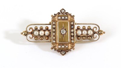 Lot 652 - A Victorian Seed Pearl and Diamond Brooch, a star set old cut diamond to a rectangular plaque...