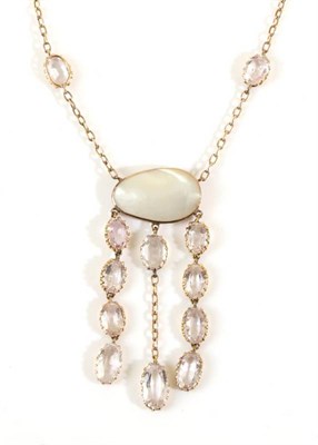 Lot 670 - A Mother-Of-Pearl and Amethyst Necklace, a mother-of-pearl plaque suspends oval cut pale...