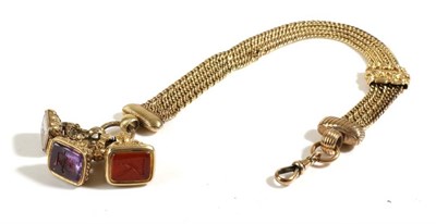 Lot 677 - An Albertina with Three Intaglio Fob Seals, a multi-strand albertina, with a floral cast slider and