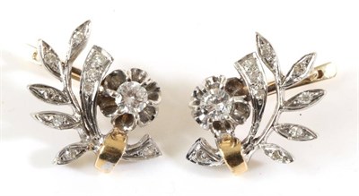 Lot 702 - A Pair of Diamond Spray Earrings, a round brilliant cut diamond in an extended claw setting to...