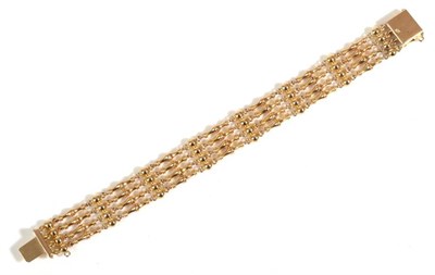 Lot 711 - A Fancy Link Bracelet, of four rows of turned bar and ball links, length 16cm