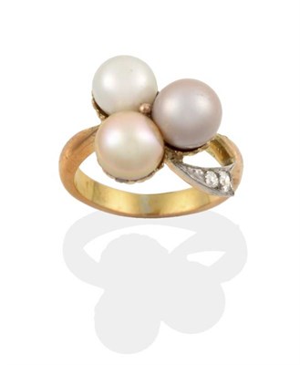 Lot 720 - A Circa 1900 Pearl and Diamond Clover Ring, white, grey and gold coloured pearls with a diamond set