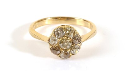 Lot 732 - A Diamond Cluster Ring, old cut diamonds in claw settings, to knife edge shoulders, total estimated