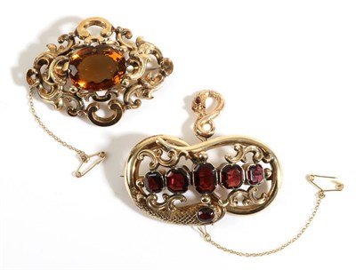 Lot 744 - A Victorian Garnet Brooch, five graduated octagonal cut garnets in collet settings within a...