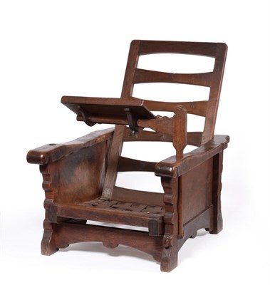 Lot 510 - A Robert  "Mouseman " Thompson Oak Reading Chair, circa 1929, with adjustable ladder back and seat