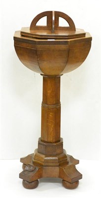 Lot 594 - A Derek  "Lizardman " Slater Oak Baptismal Font and Cover, the cover with four half circle sections