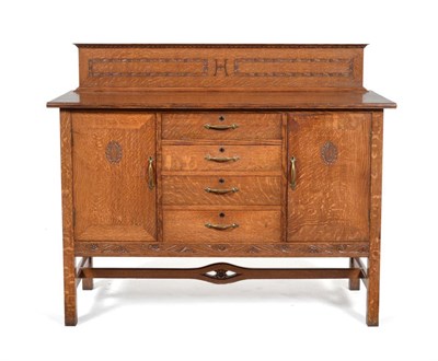 Lot 612 - A Hubert Simpson of Kendal Oak Sideboard, circa 1923, number 7536, with raised upstand with...