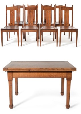 Lot 613 - A Hubert Simpson of Kendal Oak Dining Table, with two pull-outs, on four square section legs...