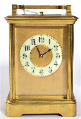 Lot 1199 - A Brass Striking and Repeating Carriage Clock, circa 1900, carrying handle and repeat button,...