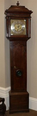 Lot 1204 - An Oak Eight Day Longcase Clock, caddied pediment, arched trunk door with a later lenticle, 12-inch