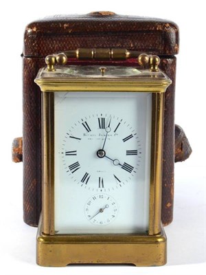 Lot 1226 - A Brass Striking and Repeating Alarm Carriage Clock, stamped for A Margaine, retailed by Howell...