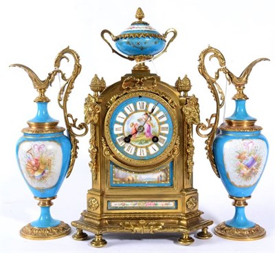 Lot 1233 - A Gilt Metal and Porcelain Mounted Striking Mantel Clock with Garniture, circa 1890, surmounted...