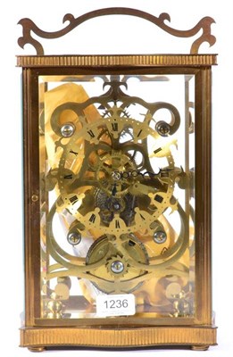 Lot 1236 - A Brass Cased Skeleton Mantel Timepiece, 20th century, five glass brass case with top carrying...