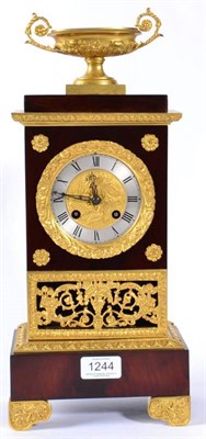 Lot 1244 - A Gilt Metal Mounted Mahogany Striking Mantel Clock, circa 1860, surmounted by a twin handled...