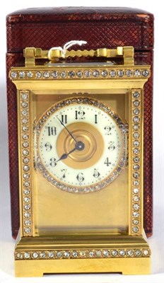 Lot 1245 - A Brass Paste Set Carriage Timepiece, circa 1900, carrying handle, paste set front borders and dial