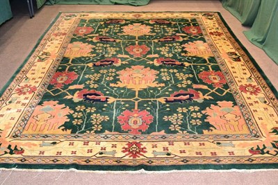 Lot 1269 - C F A Voysey Design Carpet Probably Turkey, modern The emerald green field of angular vines and...