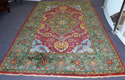 Lot 1279 - Very Finely Woven Petag Design Carpet, 20th century The raspberry field centred by a cusped...
