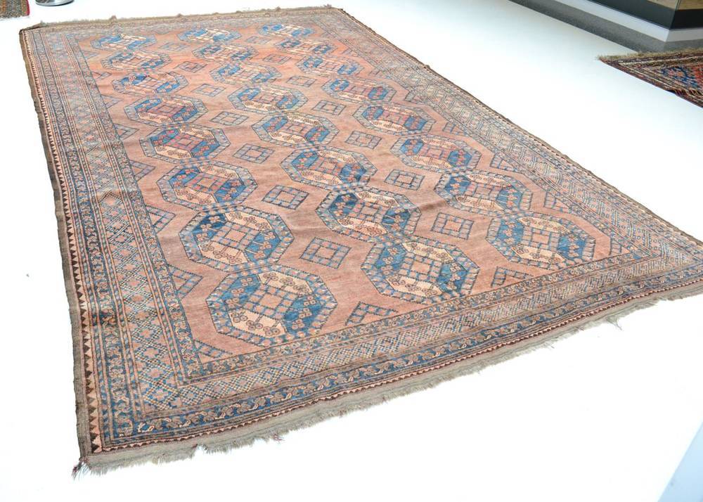 Lot 1285 - Ersari Carpet Central Amu Darya, circa 1900 The nut brown field with three columns of...