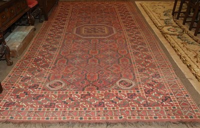 Lot 1322 - Beshir Carpet Central Oxus Region, mid 19th century The brick red diamond lattice field of stylised
