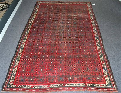 Lot 1331 - Karabagh Rug Central Caucasus, circa 1900 The compartmentalised field of hooked devices enclosed by