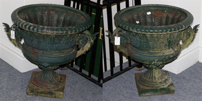 Lot 1333 - A Pair of Victorian Green Painted Cast Iron Garden Urns, of campana form with scroll handles,...