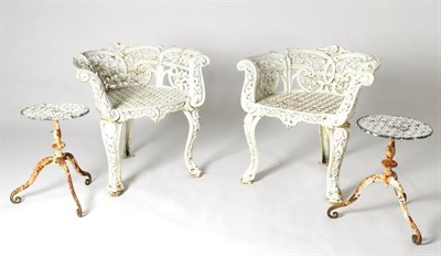 Lot 1336 - A Pair of Late Victorian White Painted Cast Iron Garden Armchairs, circa 1900, the scrolled arm...
