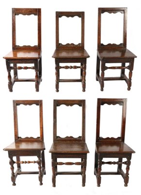 Lot 1339 - A Harlequin Set of Six Early 18th Century Joined Oak Chairs, possibly Lorraine, the boarded...