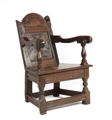 Lot 1357 - A Joined Oak Armchair, dated 1592, with guilloche patterned top rail above a geometric...