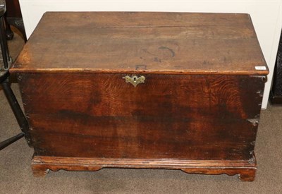 Lot 1363 - A Mid 18th Century Oak Chest, with hinged lid and moulded base above scrolled bracket feet, 96cm by