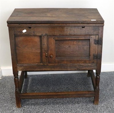 Lot 1367 - A Joined Oak Food Cupboard, the rectangular top with two extending small leaves above a fielded...