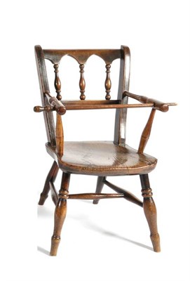 Lot 1372 - A Late 19th Century Fruitwood and Elm Seated Child's High Chair, with spindle turned arms above...