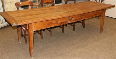 Lot 1373 - A 19th Century French Cherrywood Farmhouse Table, of plank construction with cleated ends, a drawer