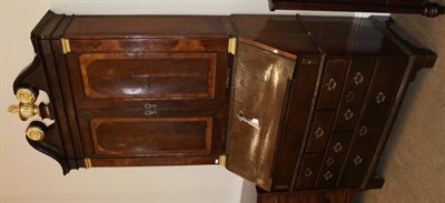 Lot 1374 - A Walnut Bureau Bookcase, in three sections, the swan neck pediment above two cupboard doors...