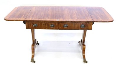 Lot 1382 - A Regency Kingwood and Satinwood Crossbanded Sofa Table, early 19th century, with two real and...
