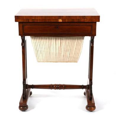 Lot 1412 - A Victorian Rosewood Games/Work Table, mid 19th century, the hinged leaf above a long frieze drawer