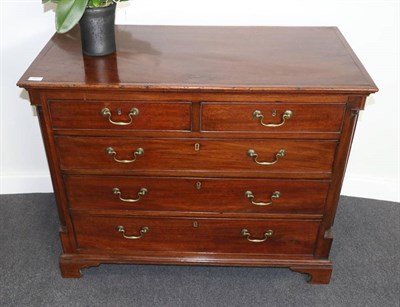 Lot 1417 - A George III Mahogany Straight Front Chest of Drawers, of two short over three long drawers all...