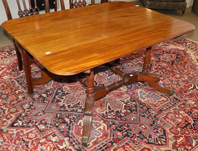 Lot 1430 - A Mahogany Dropleaf Table, 19th century and adapted, with two rounded drop leaves and a reed...