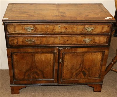 Lot 1444 - A George II Style Walnut and Featherbanded Chest, the crossbanded and quarter-veneered top...