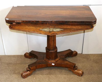 Lot 1449 - A Regency Rosewood Foldover Card Table, early 19th century, the hinged leaf enclosing a green baize