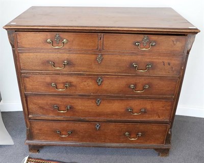 Lot 1455 - A George III Mahogany Secretaire Chest, late 18th century, the fall front enclosing a fitted...