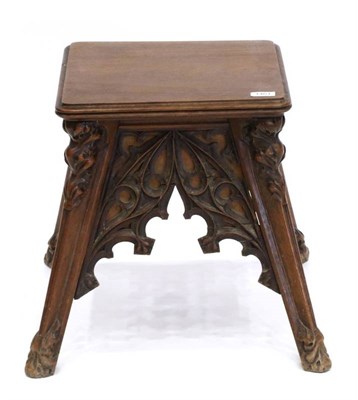 Lot 1461 - A Victorian Gothic Revival Carved Walnut Plant Stand, the moulded top with scrolled and carved...