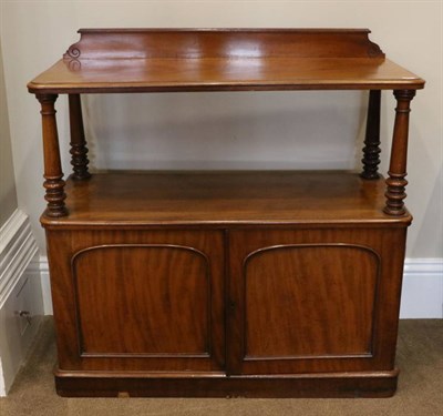 Lot 1470 - A Victorian Mahogany Dumb Waiter, circa 1870, with superstructure and turned gun barrel...