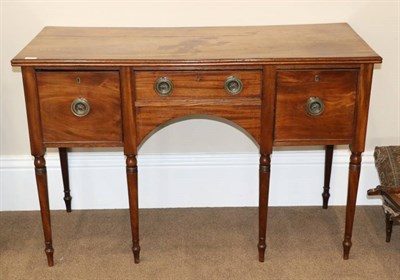 Lot 1474 - A Regency Mahogany Straight Front Sideboard, early 19th century, the reeded edge above a...