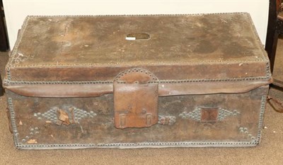Lot 1475 - A George III Leather and Brass-Studded Trunk, with brass plaque engraved CAPTAIN CARR,...